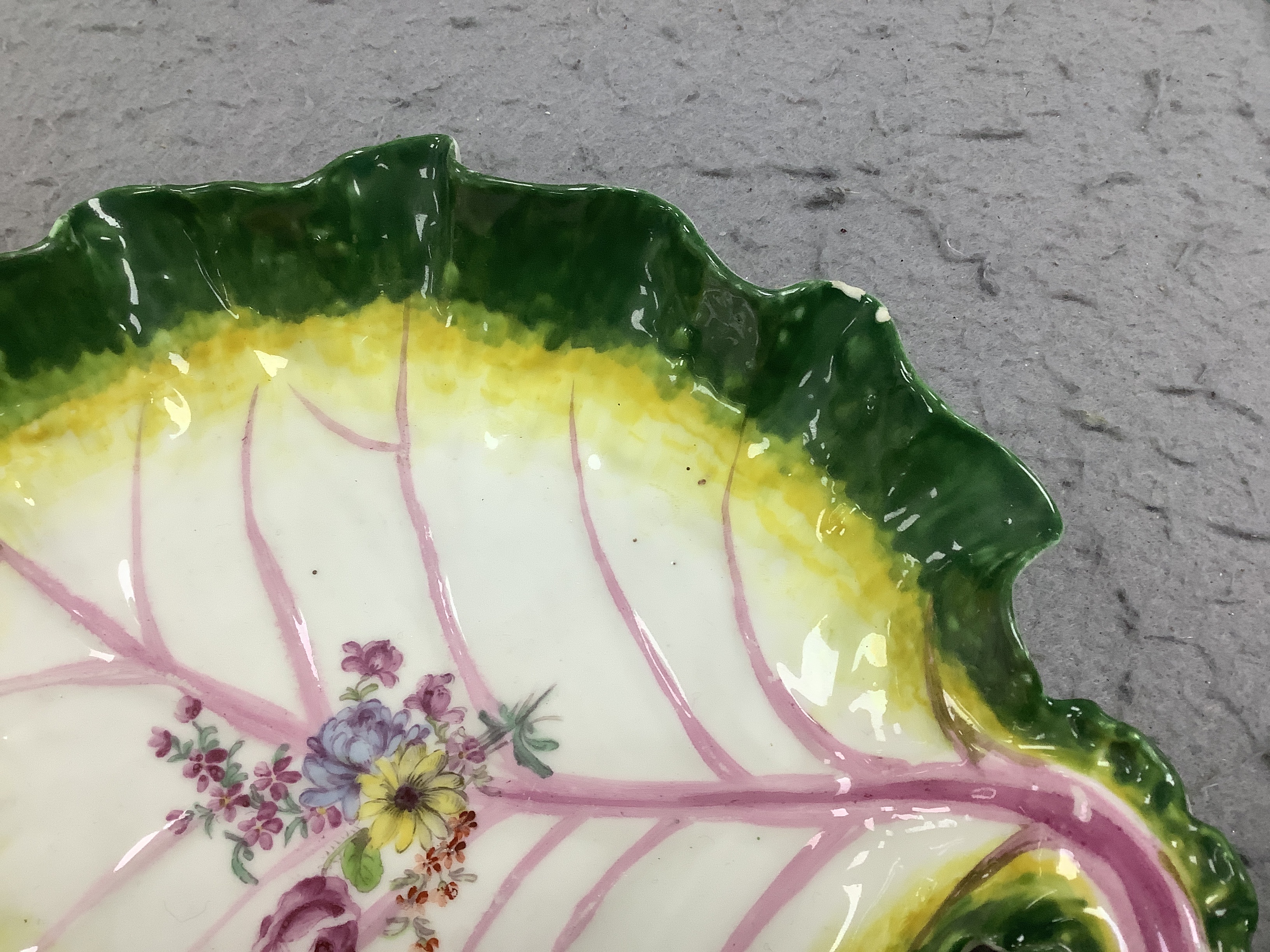 A Chelsea red anchor leaf dish, mark to the base, 24cm wide